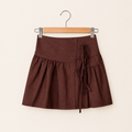 Cocoa linen wrap skirt for girls with wrap-inspired silhouette and natural linen texture